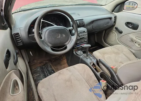 1999 Saturn Sc1 z USA, uszkodzony, nr VIN 1G8ZP1287XZ243932